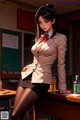 A woman in a school uniform sitting at a desk.